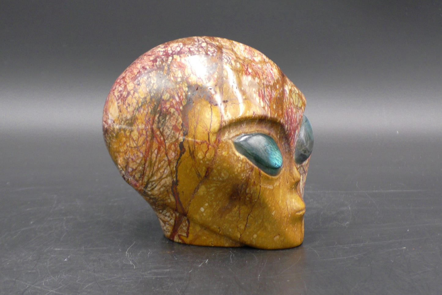 Beautiful Brecciated Jasper Alien Skull with Labradorite Eyes - 1223 g. - Size: 100 mm