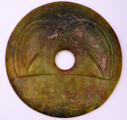 RARE VERY LARGE JADE DISC DEPICTING AN EAGLE