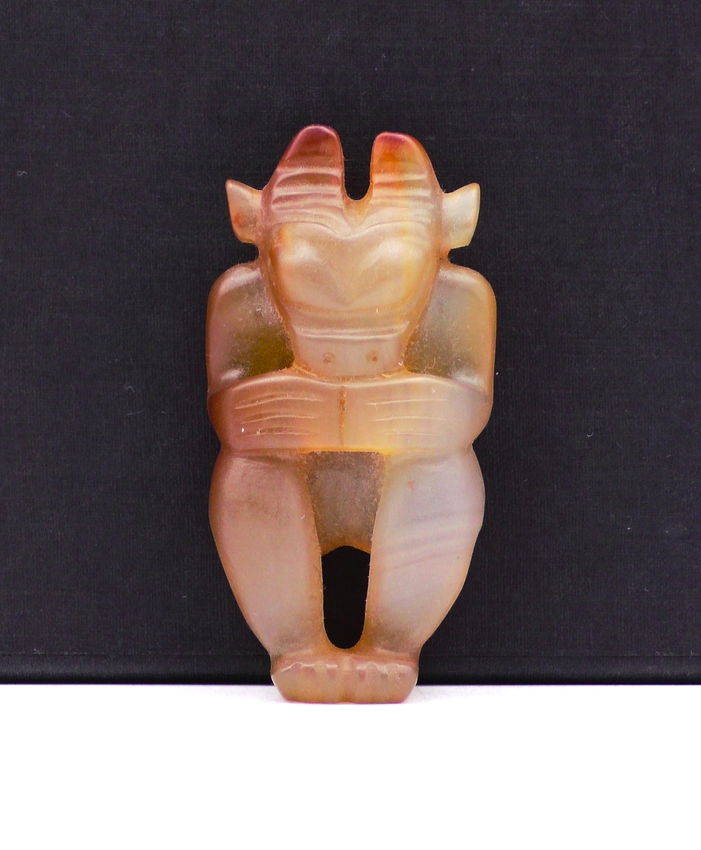 SMALL TRANSLUSCENT AGATE STONE HORNED DEITY